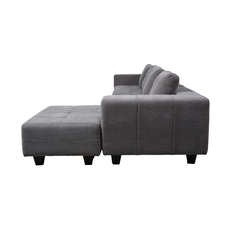 Stor modulær L-formet sofa i lysegråt stof med firkantede puder, moderne minimalistisk stil Stor modulær L-formet sofa i lysegråt stof med firkantede puder, moderne minimalistisk stil